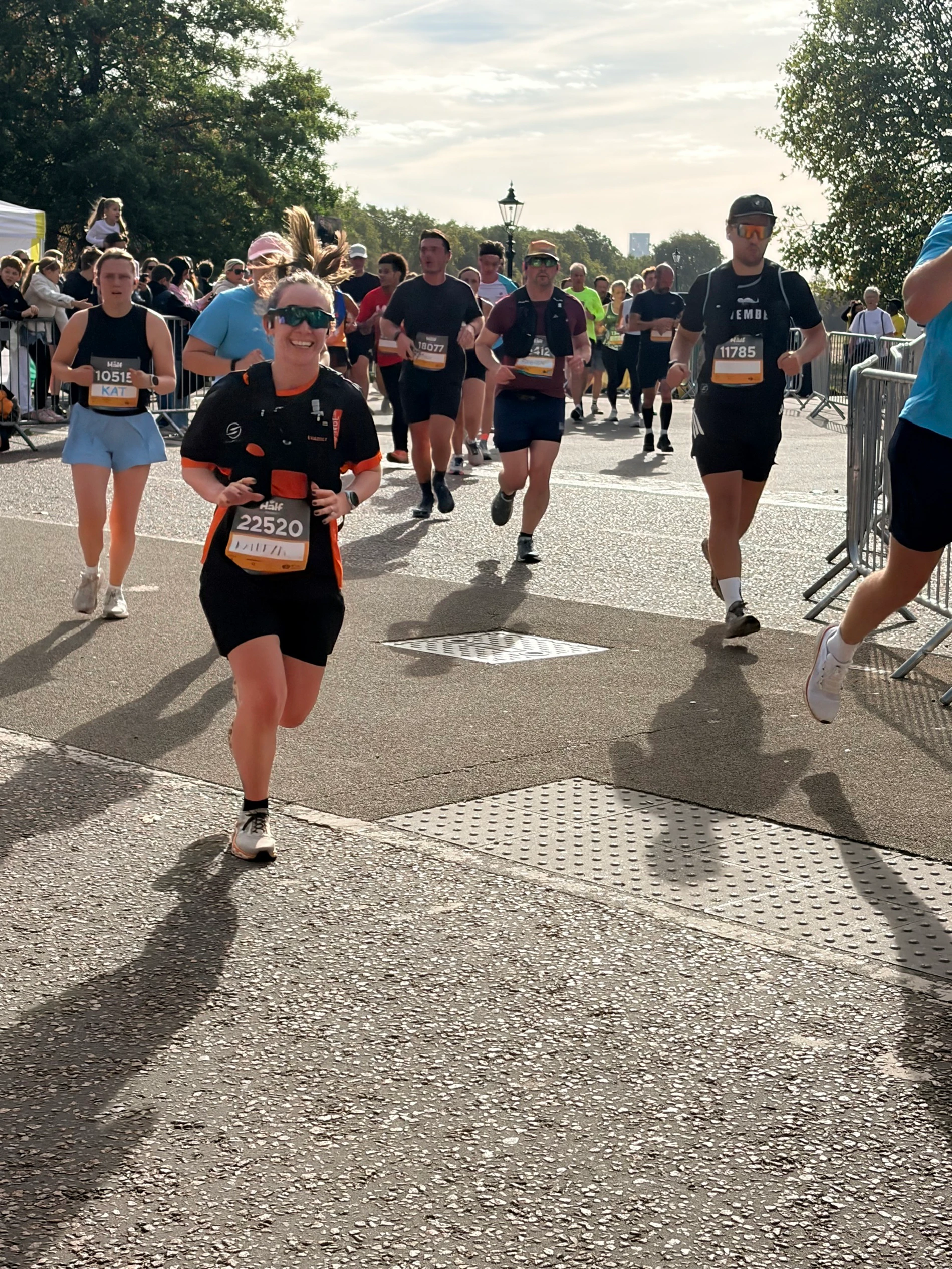 Mix of runners at Royal Parks Half Marathon with Kathryn in the foreground