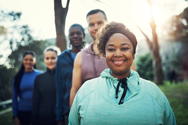 Friends working out in park