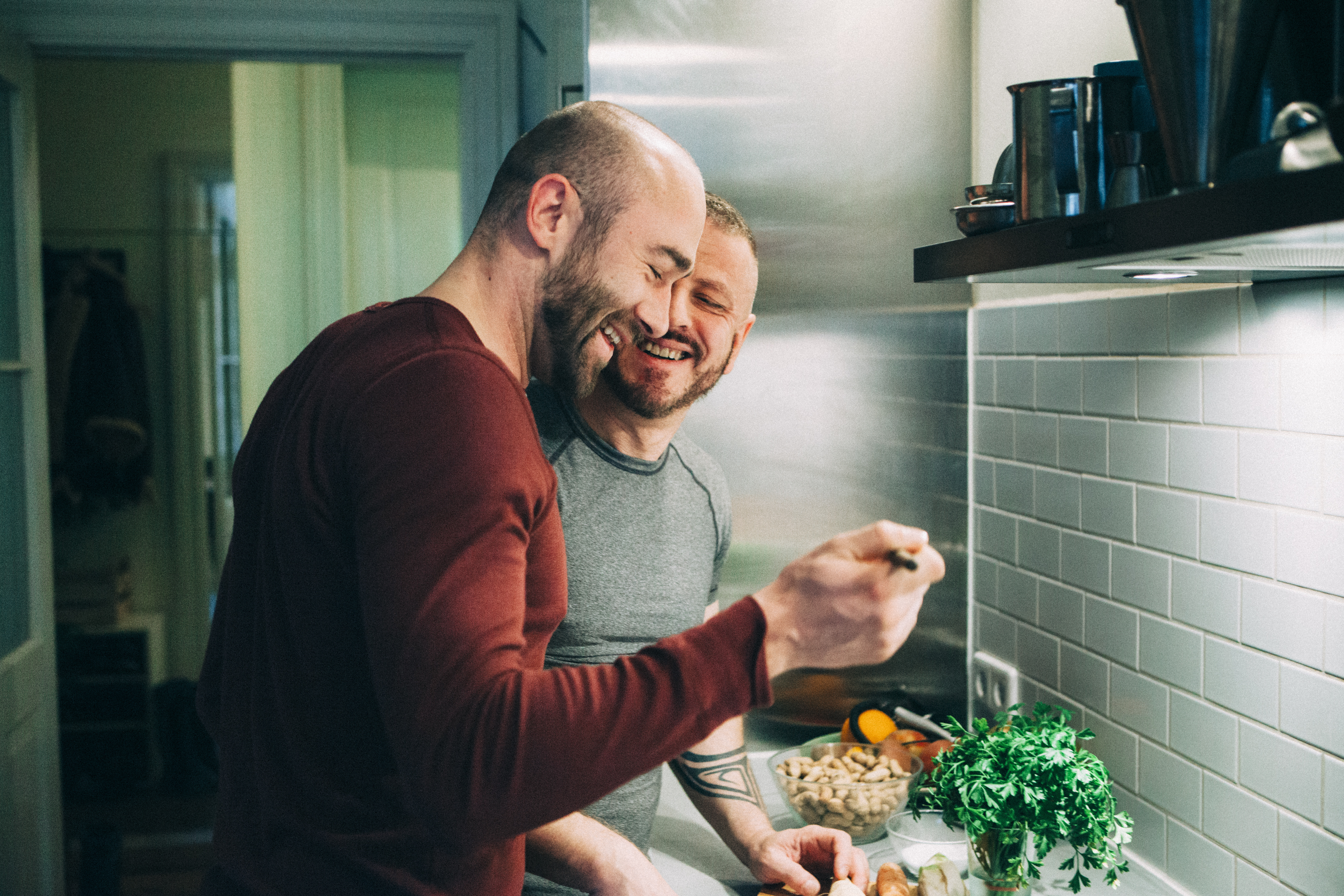 Gay couple preparing food