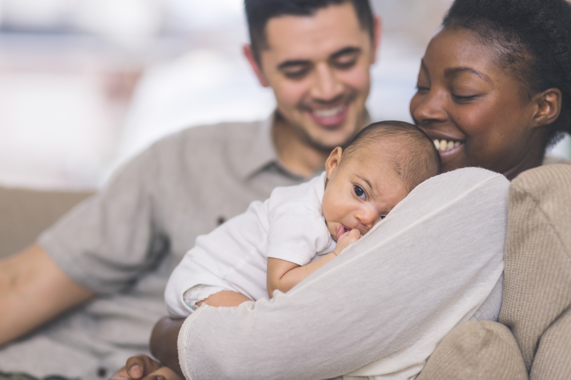New Mom Holds Her Infant To Her Chest Istock 901666764