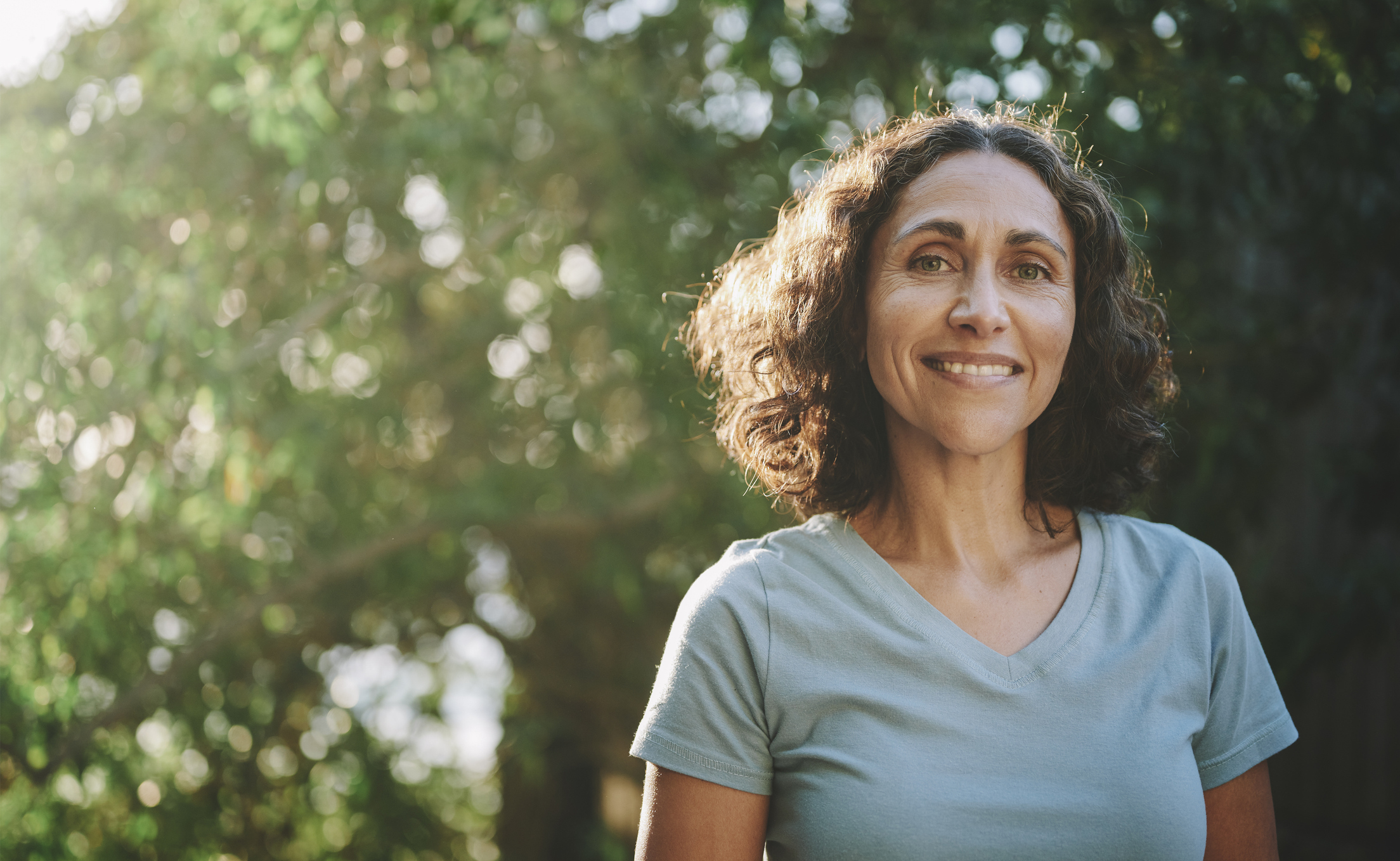 Smiling woman in park