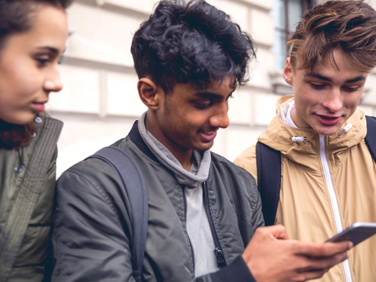 Teens on mobile phone