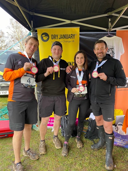 Ollie, Danielle, Robin and Luke with their Dry January 10k medals