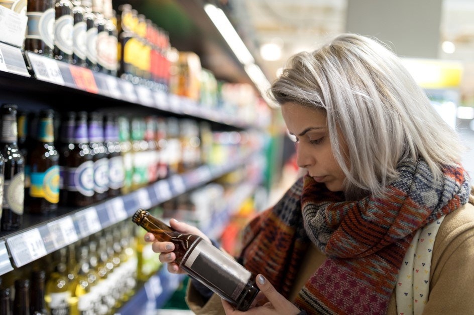 Woman looking at label 2