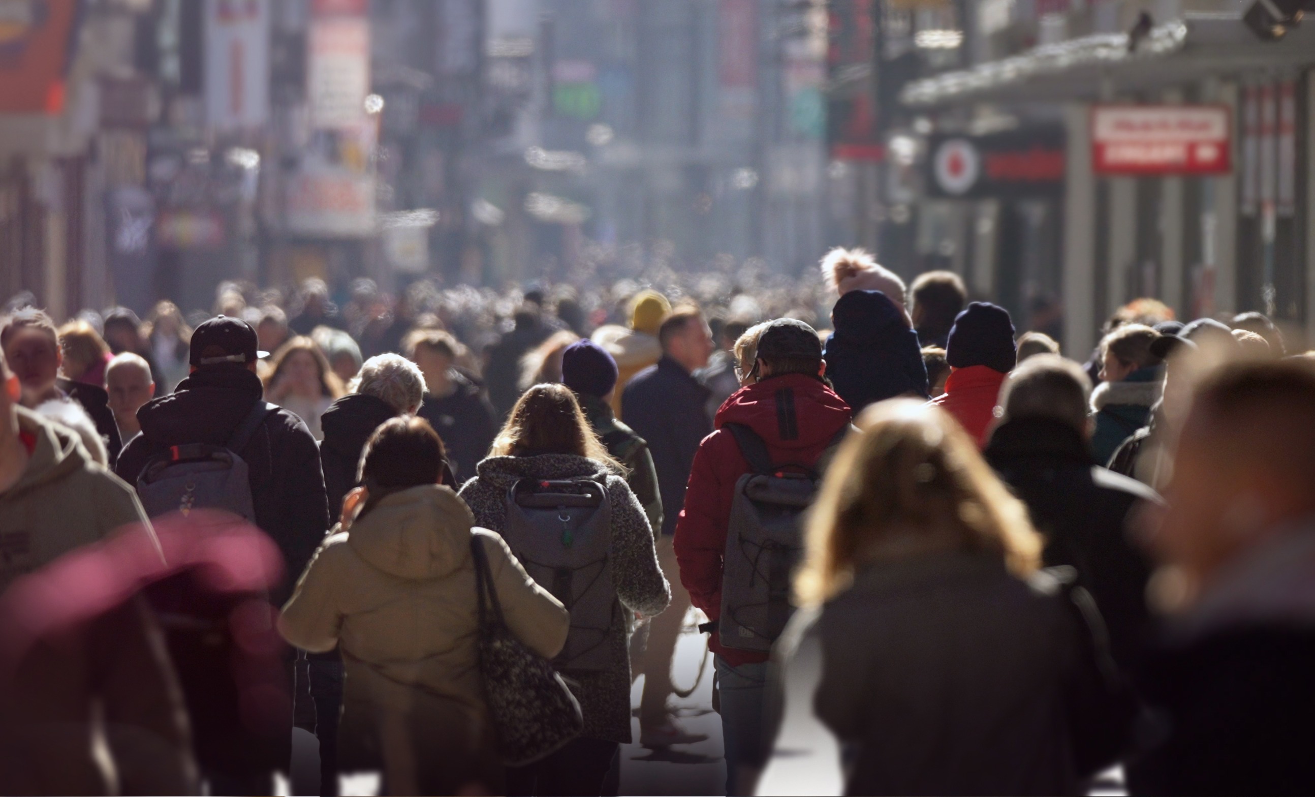 People walking down street