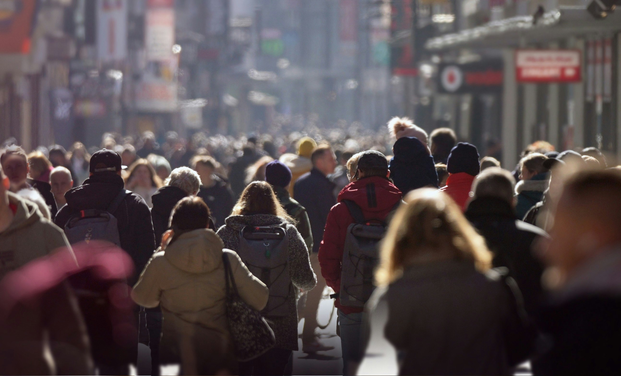 People walking down street